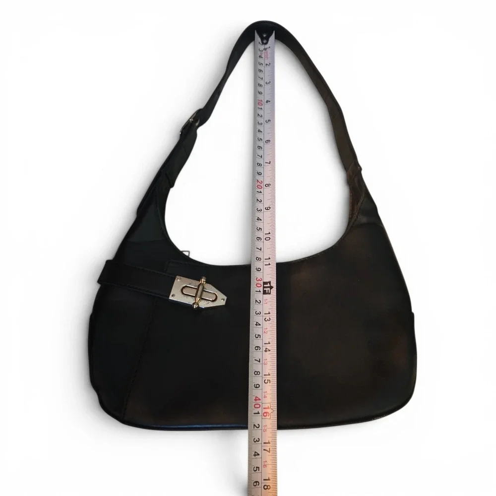 Minimalist black hobo shoulder bag gold hardware under arm‎